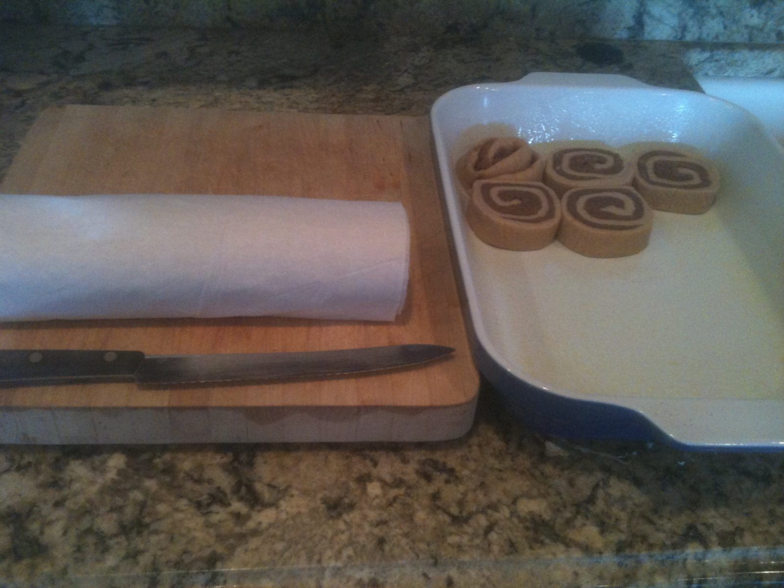 Cutting an Placing the Cinnamon Rolls stone ground, whole wheat, wheat flour, oats, gluten fee, baking recipes, flour, gluten free recipes, oatmeal,oatmeal, steel cut, pancake recipe, oats gluten free bread, wheat flour, flour